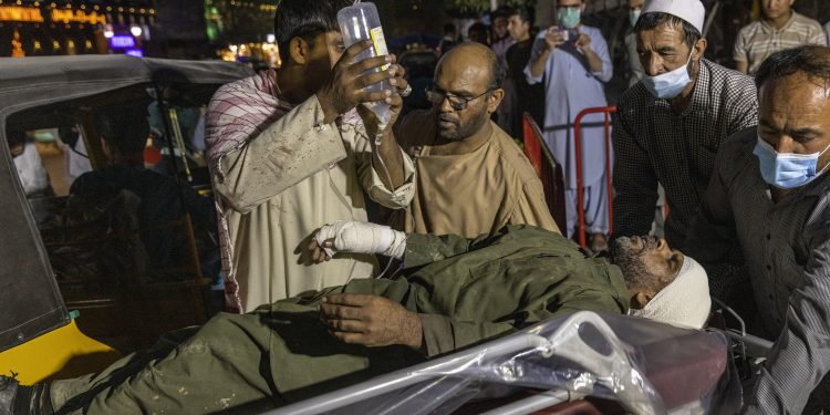 Suicide bomb striking Kabul airport  kills 60 Afghans, 13 US troops